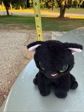 Plush Black Cat Toy with Green Eyes and Pink Accents